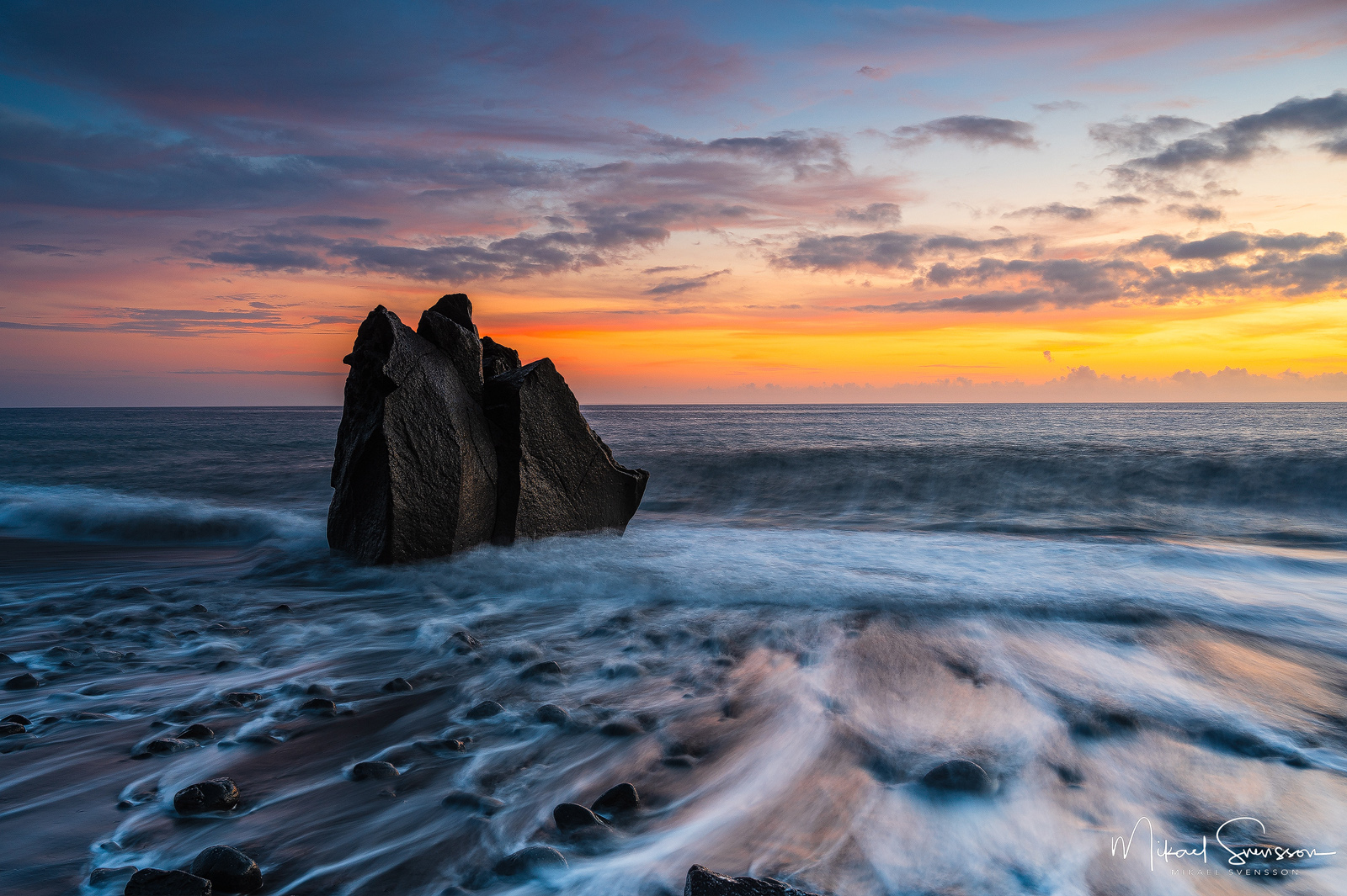 Sunset at Praia Formosa, Madeira.